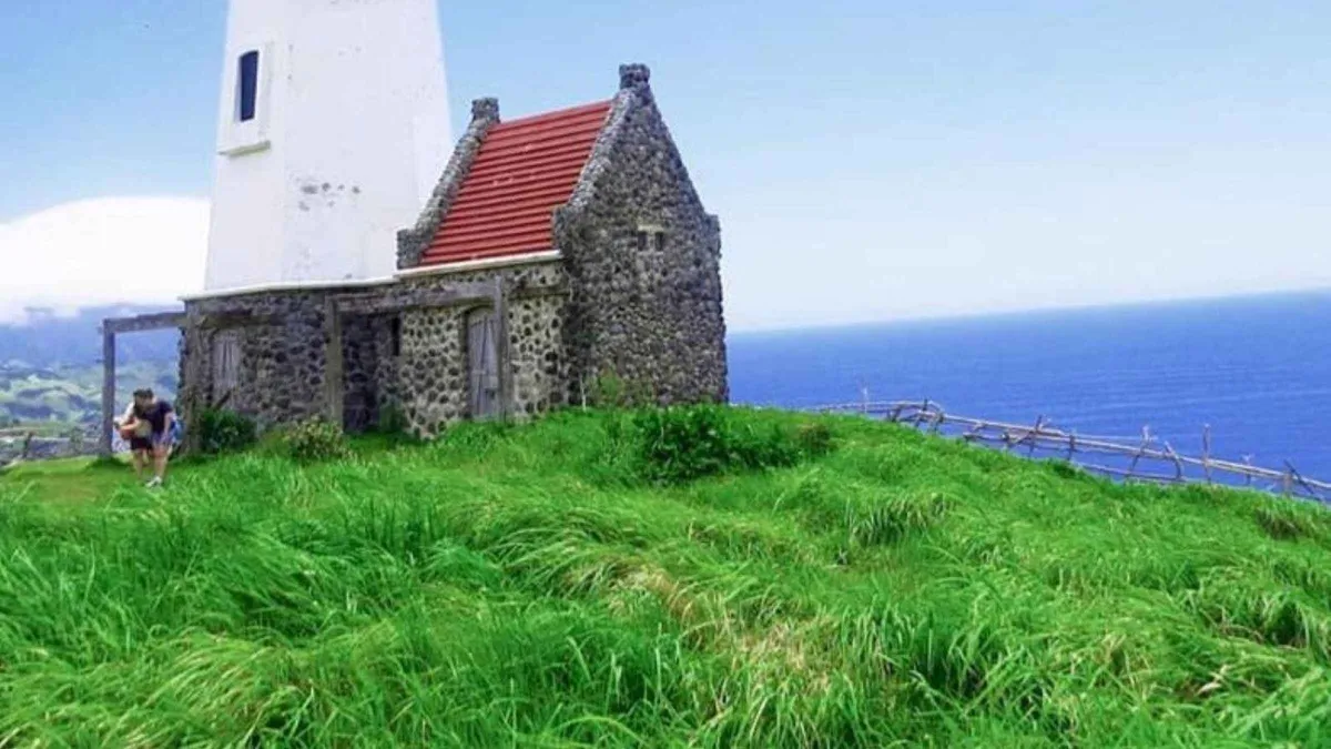 Ivatan stone houses under cogon-grass roofs in a Sabtang village, visited on 4-day Batanes tours in the Philippines